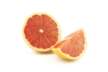 Half and slice of grapefruit