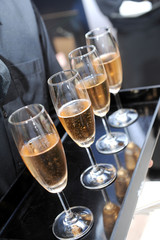 Waiter serving champagne