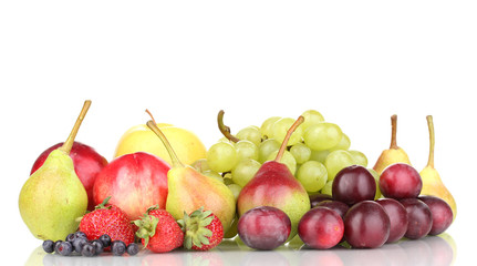 Mix of ripe sweet fruits and berries isolated on white
