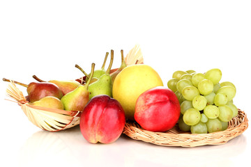 ripe sweet fruits and berries isolated on white