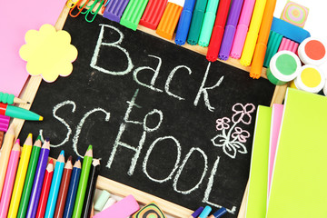 The words 'Back to School' written in chalk