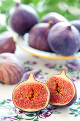 Ripe fresh Fig fruits on a beautiful tablecloth.