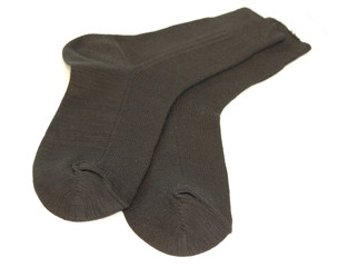 man's black socks isolated on white background