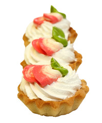 sweet cake with cream isolated on white