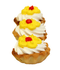 sweet cake with cream isolated on white