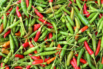 chilli red and green peppers as background