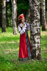 The girl in the Park playing hide and seek