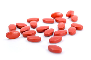 Obraz na płótnie Canvas crimson oval pills