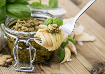 Spaghetti on fork with Pesto