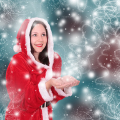 Miss Santa mit Glitzer vor blauem Hintergrund