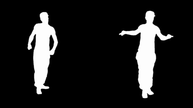 Silhouette of a young man breakdancing