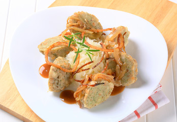 German bread dumplings with sauerkraut and onion