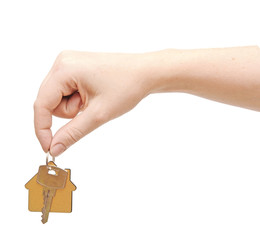 Obraz premium hand with chrome house key isolated on white