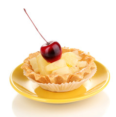 sweet cake with fruits on saucer isolated on white