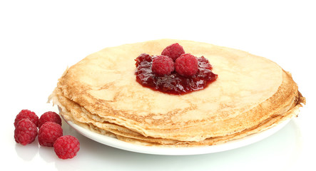 Delicious pancakes with jam and raspberries