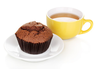 Fresh muffin with tea isolated on white