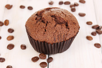 Fresh muffin on wooden background