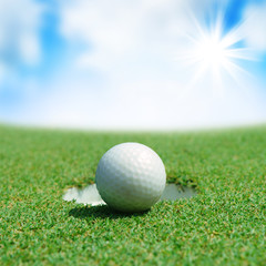 Golf ball on green