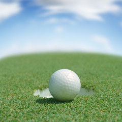 Golf ball on green