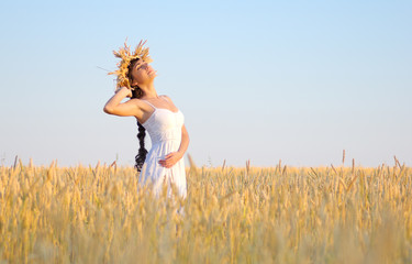 Girl on wheat field