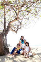 asian family at the beach