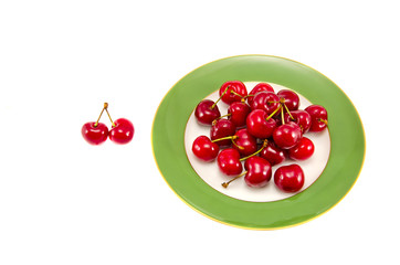 fresh cherry berry in plate isolated on white