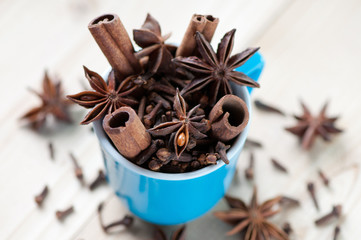 Espresso cup with different spices, view from above