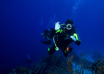 Diver, showing ok sign, Cuba