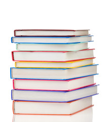 stack of colorful books isolated on white