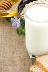 milk products and cheese on wooden