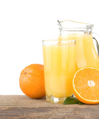 juice and oranges isolated on white