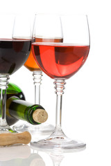 red wine in glass and bottle isolated on white