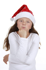 Mädchen mit Weihnachtsmütze