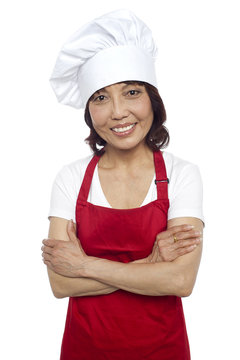 Smiling Portrait Of Confident Asian Chef