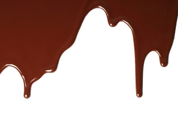 Melted chocolate dripping on white background