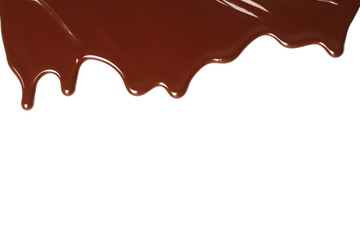 Melted chocolate dripping on white background