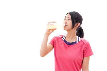 a beautiful asian woman drinking