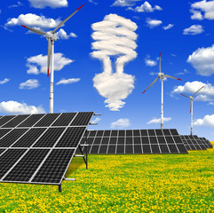 Bulb from clouds above the solar panels with wind turbines