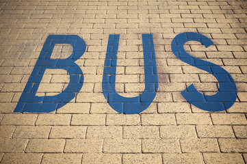 Obraz premium BUS writing on the road surface