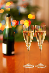 Beautiful Christmas setting with champagne and Christmas tree in