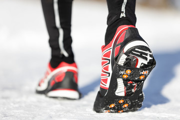 Fototapeta premium Running shoes in snow