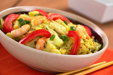 Rice dish with cabbage, chicken, shrimp, tomato, scallion