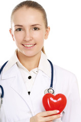 Positive female doctor standing with stethoscope