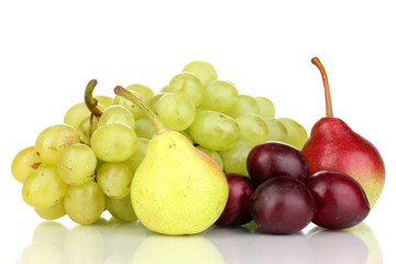 Mix of ripe sweet fruits and berries isolated on white