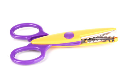 Colorful zigzag scissors isolated on white