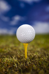 Golf ball on green grass