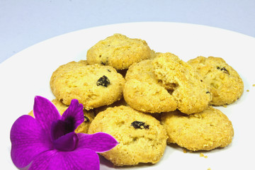 Freshly baked cookies on a white plate path is included