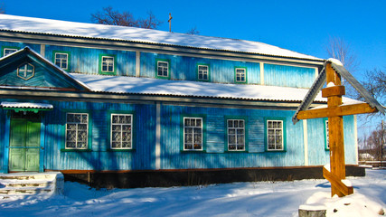 Long rural church in winter