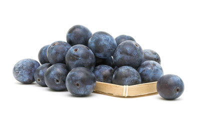 Plums on a white background close-up