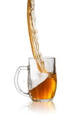 Pouring beer into glass, isolated on white background